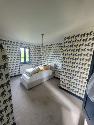 wall papered bedroom